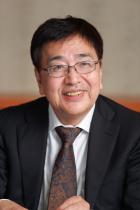 北川 哲雄 氏